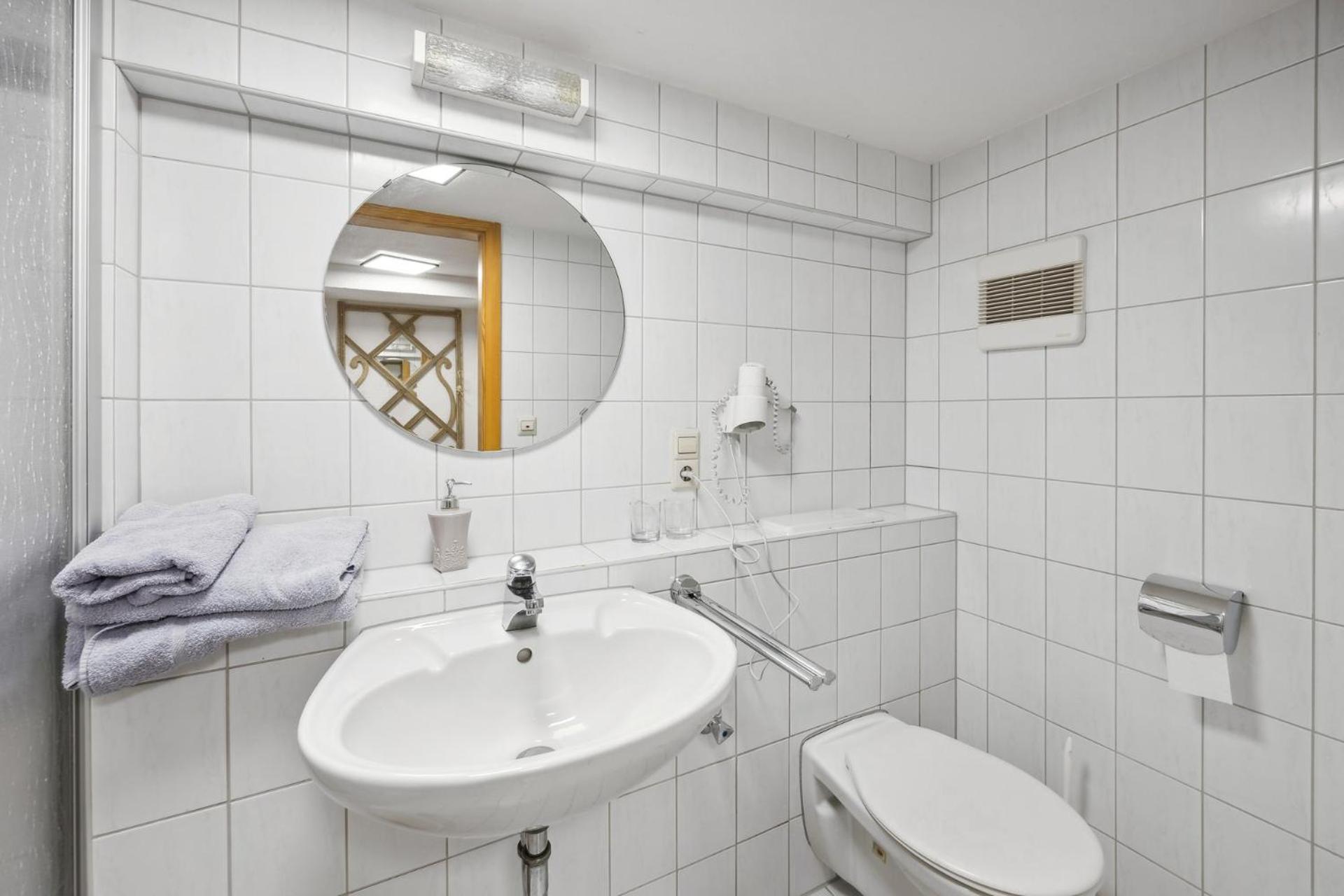 Deluxe Vierbettzimmer mit Balkon